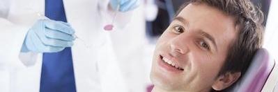 man during emergency dentistry exam in uptown charlotte nc