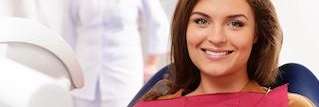 woman getting a dental crown in charlotte nc