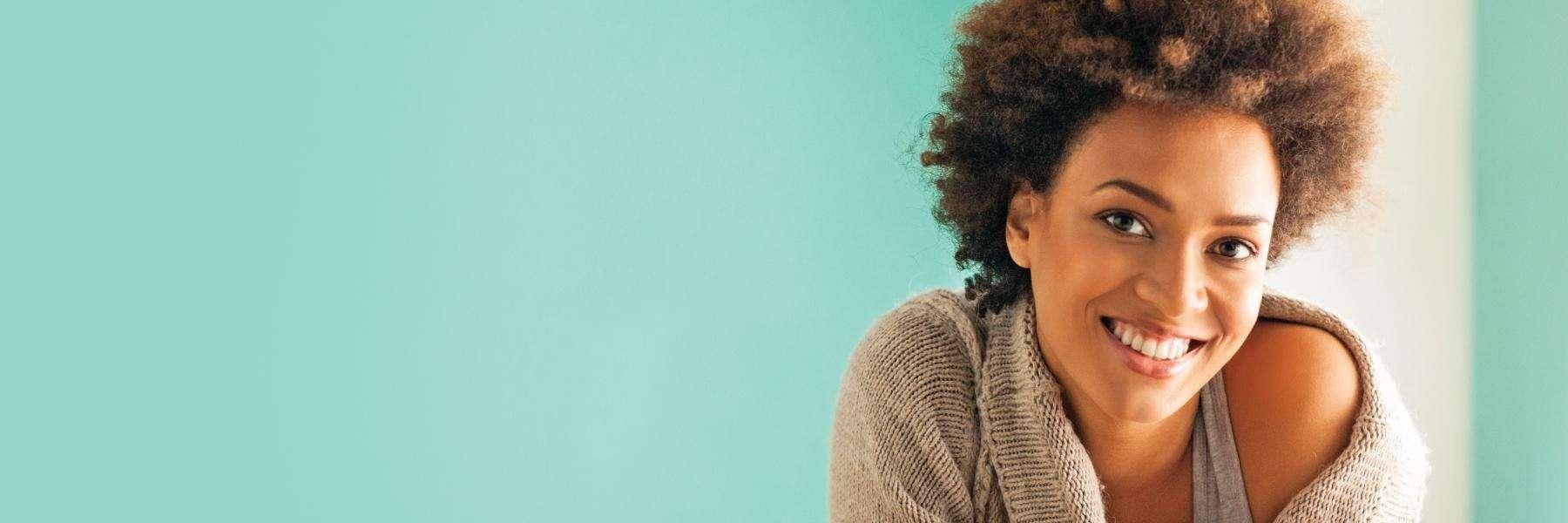 girl with dental implants in charlotte nc