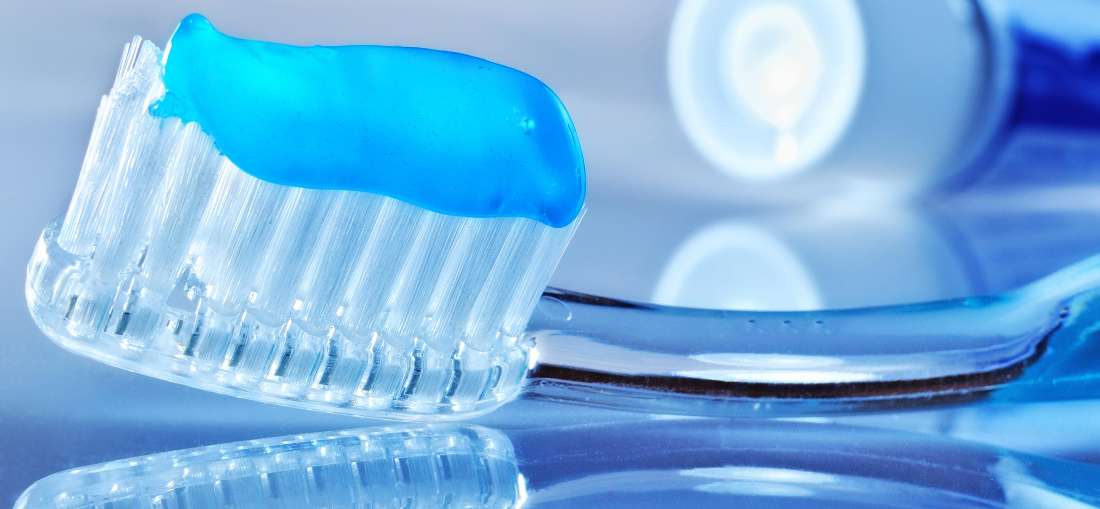 Brush having Colgate