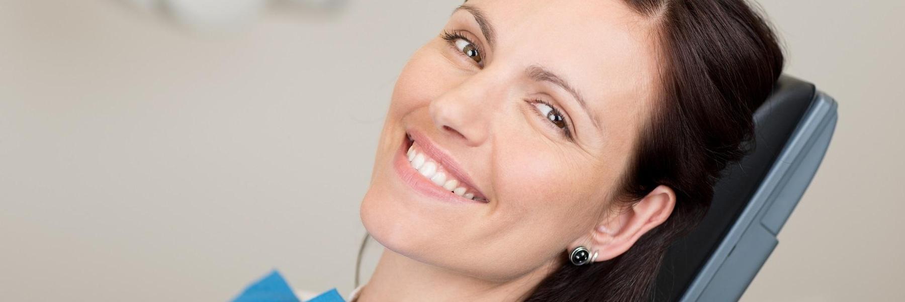 woman during a dental exam in charlotte nc