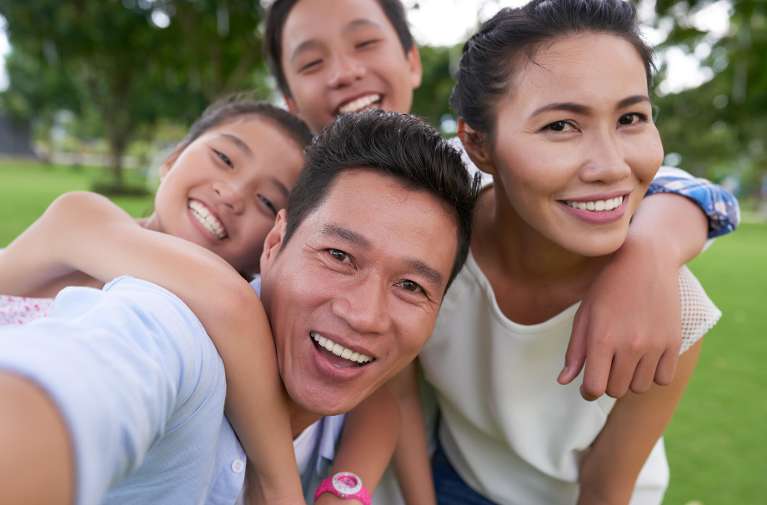 Asian family smiling together, charlotte nc
